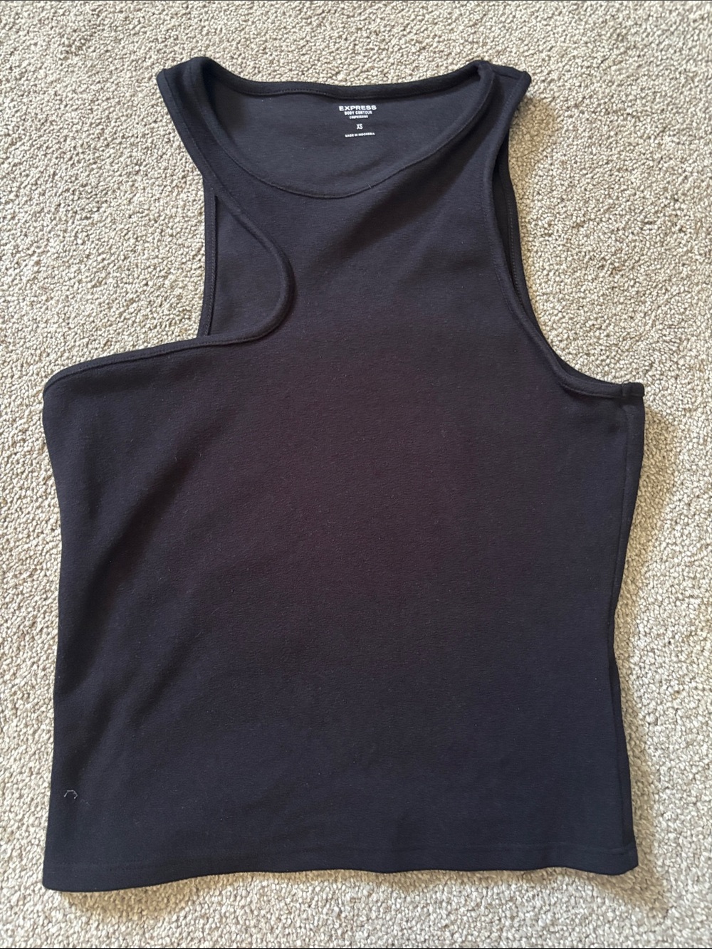Express body contour asymmetrical tank top